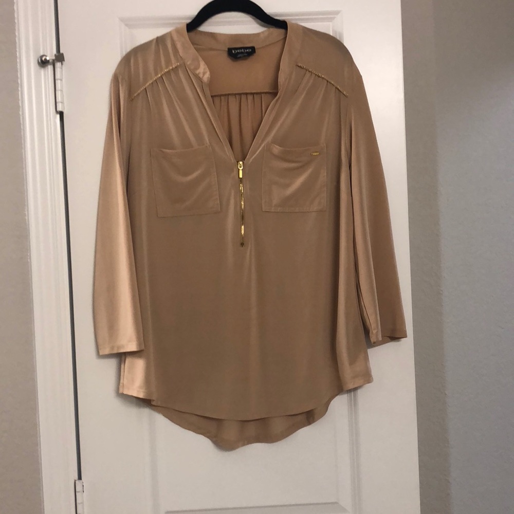 Bebe women’s beige large blouse